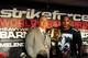 May 19, 2012; San Jose, CA, USA; Daniel Cormier (right) poses with the Strikeforce chief executive officer Scott Coker (left) after defeating Josh Barnett (not pictured) during the heavyweight tournament final bout of the Strikeforce World Grand Prix at HP Pavilion. Mandatory Credit: Kyle Terada-US PRESSWIRE