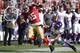 SAN FRANCISCO, CA - AUGUST 10: Brandon Jacobs #45 of the San Francisco 49ers gets pushed out of bounds after a twenty two yard gain by Jamarca Sanford #33 of the Minnesota Vikings in the first quarter during an NFL pre-season football game at Candlestick Park on August 10, 2012 in San Francisco, California. (Photo by Thearon W. Henderson/Getty Images)