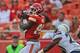 KC's Dwayne Bowe offsets Tampa Bay's Vincent Jackson.