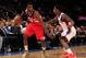 NEW YORK, NY - APRIL 13: John Wall #2 of the Washington Wizards drives against Iman Shumpert #21 of the New York Knicks at Madison Square Garden on April 13, 2012 in New York City. NOTE TO USER: User expressly acknowledges and agrees that, by downloading and/or using this Photograph, user is consenting to the terms and conditions of the Getty Images License Agreement. (Photo by Chris Trotman/Getty Images)