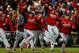 WASHINGTON, DC - OCTOBER 12: The St. Louis Cardinals celebrate after defeating the Washington Nationals 9-7 in Game Five of the National League Division Series at Nationals Park on October 12, 2012 in Washington, DC. (Photo by Rob Carr/Getty Images)