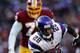 LANDOVER, MD - DECEMBER 24: Running back Adrian Peterson #28 of the Minnesota Vikings rushes for yards against the Washington Redskins in the second quarter at FedEx Field on December 24, 2011 in Landover, Maryland. The Minnesota Vikings won, 33-26. (Photo by Patrick Smith/Getty Images)