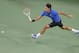 SHANGHAI, CHINA - OCTOBER 12: Roger Federer of Switzerland returns a shot to Marin Cilic of Croatia during the Men's Single Quarterfinals of the Shanghai Rolex Masters at the Qi Zhong Tennis Center on October 12, 2012 in Shanghai, China. (Photo by Lintao Zhang/Getty Images)