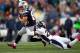 FOXBORO, MA - OCTOBER 7: Wes Welker #83 of the New England Patriots runs by Chris Harris #25 of the Denver Broncos in the first half for a touchdown at Gillette Stadium on October 7, 2012 in Foxboro, Massachusetts. (Photo by Jim Rogash/Getty Images)