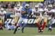 DETROIT - OCTOBER 16: Jahvid Best #44 of the Detroit Lions runs for a 36 yard gain after a short pass from quarterback Matthew Stafford #9 during the NFL game against the San Francisco 49ers at Ford Field on October 16, 2011 in Detroit, Michigan. The 49ers defeated the Lions 25-19. (Photo by Leon Halip/Getty Images)