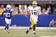 INDIANAPOLIS, IN - OCTOBER 07: Aaron Rodgers #12 of the Green Bay Packers runs with the ball during the NFL game against the Indianapolis Colts at Lucas Oil Stadium on October 7, 2012 in Indianapolis, Indiana. (Photo by Andy Lyons/Getty Images)