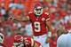 KANSAS CITY, MO - AUGUST 10: Quarterback Brady Quinn #9 of the Kansas City Chiefs calls out a play against the Arizona Cardinals during the first half on August 10, 2012 at Arrowhead Stadium in Kansas City, Missouri. (Photo by Peter Aiken/Getty Images)
