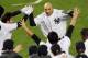 NEW YORK, NY - OCTOBER 10: Raul Ibanez #27 of the New York Yankees reacts after hitting a walk off home run in the bottom of the twelfth inning to defeat the Baltimore Orioles in Game Three of the American League Division Series at Yankee Stadium on October 10, 2012 in the Bronx borough of New York City. (Photo by Alex Trautwig/Getty Images)