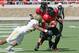 Oct 13, 2012; Lubbock, TX, USA; Texas Tech Red Raiders running back Eric Stephens Jr. (24) rushes against the West Virginia Mountaineers in the first half at Jones AT&T Stadium. Mandatory Credit: Michael C. Johnson-US PRESSWIRE