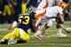 Michigan's Mario Ojemudia (53)