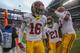 SEATTLE, WA - OCTOBER 13: Cornerback Anthony Brown #16 of the USC Trojans is congratulated by teammates after scoring a touchdown on a blocked punt against the Washington Huskies on October 13, 2012 at CenturyLink Field in Seattle, Washington. (Photo by Otto Greule Jr/Getty Images)