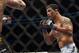 Dec 10, 2011; Toronto, ON, Canada; UFC fighter Frank Mir (left) fights against fighter Minotauro Nogueira during a heavyweight bout at UFC 140 at the Air Canada Centre. Mandatory Credit: Tom Szczerbowski-US PRESSWIRE