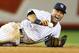 NEW YORK, NY - OCTOBER 13: Derek Jeter #2 of the New York Yankees reacts after he injured his leg in the top of the 12th inning against the Detroit Tigers during Game One of the American League Championship Series at Yankee Stadium on October 13, 2012 in the Bronx borough of New York City, New York. (Photo by Al Bello/Getty Images)