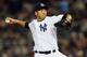 NEW YORK, NY - OCTOBER 10: Hiroki Kuroda #18 of the New York Yankees pitches during Game Three of the American League Division Series against the Baltimore Orioles at Yankee Stadium on October 10, 2012 in the Bronx borough of New York City. (Photo by Elsa/Getty Images)