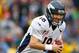 FOXBORO, MA - OCTOBER 7: Peyton Manning #18 of the Denver Broncos runs the ball against the New England Patriots at Gillette Stadium on October 7, 2012 in Foxboro, Massachusetts. (Photo by Jim Rogash/Getty Images)