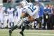 EAST RUTHERFORD, NJ - OCTOBER 14: Andrew Luck #12 of the Indianapolis Colts is tackled by LaRon Landry #12 of the New York Jets at MetLife Stadium on October 14, 2012 in East Rutherford, New Jersey. (Photo by Nick Laham/Getty Images)