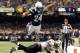 NEW ORLEANS, LA - OCTOBER 07: Ryan Mathews #24 of the San Diego Chargers dives over Malcolm Jenkins #27 of the New Orleans Saints to score a touchdown and lead 24-14 lead during the third quarter at Mercedes-Benz Superdome on October 7, 2012 in New Orleans, Louisiana. (Photo by Harry How/Getty Images)