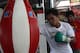 GENERAL SANTOS, PHILIPPINES - SEPTEMBER 27: Manny Pacquiao uses punch bag during a training session at Golingan Gymnasium on September 27, 2012 in General Santos, Philippines. Pacquiao will take on Mexican Juan Manual Marquez on December 8, 2012 in Las Veg2as. (Photo by Jeoffrey Maitem/Getty Images)