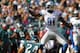 PHILADELPHIA, PA - OCTOBER 14: Wide receiver Calvin Johnson #81 of the Detroit Lions reacts after making a first down catch as Nnamdi Asomugha #24 of the Philadelphia Eagles defends during the first half in a game at Lincoln Financial Field on October 14, 2012 in Philadelphia, Pennsylvania. The Lions defeated the Eagles 26-23 in overtime. (Photo by Rich Schultz /Getty Images)