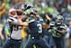SEATTLE, WA - OCTOBER 14: Quarterback Russell Wilson #3 of the Seattle Seahawks passes against the New England Patriots at CenturyLink Field on October 14, 2012 in Seattle, Washington. The Seahawks defeated the Patriots 24-23. (Photo by Otto Greule Jr/Getty Images)