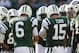 EAST RUTHERFORD, NJ - OCTOBER 14: Mark Sanchez #6 and Tim Tebow #15 of the New York Jets talk to the huddle against the Indianapolis Colts at MetLife Stadium on October 14, 2012 in East Rutherford, New Jersey. (Photo by Nick Laham/Getty Images)