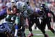 BALTIMORE, MD - OCTOBER 14: Running back Felix Jones #28 of the Dallas Cowboys breaks through a pack of Baltimore Ravens defenders in the third quarter at M&T Bank Stadium on October 14, 2012 in Baltimore, Maryland. The Baltimore Ravens won, 31-29. (Photo by Patrick Smith/Getty Images)