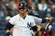 NEW YORK, NY - OCTOBER 14: Nick Swisher #33 of the New York Yankees reacts after he struck out in the fifth inning against the Detroit Tigers during Game Two of the American League Championship Series at Yankee Stadium on October 14, 2012 in the Bronx borough of New York City. (Photo by Elsa/Getty Images)