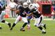 GLENDALE, AZ - OCTOBER 14: Kevin Kolb #4 of the Arizona Cardinals pitches the ball to teammate William Powell #33 against the Buffalo Bills at University of Phoenix Stadium on October 14, 2012 in Glendale, Arizona. Buffalo won 19-16. (Photo by Norm Hall/Getty Images)