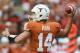 AUSTIN, TX - OCTOBER 06: David Ash #14 of the Texas Longhorns throws the ball against the West Virginia Mountaineers at Darrell K Royal-Texas Memorial Stadium on October 6, 2012 in Austin, Texas. (Photo by Ronald Martinez/Getty Images)