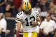HOUSTON, TX - OCTOBER 14: Aaron Rodgers #12 of the Green Bay Packers celebrates after a touchdown pass in the fourth quarter against the Houston Texans at Reliant Stadium on October 14, 2012 in Houston, Texas. (Photo by Scott Halleran/Getty Images)