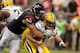 HOUSTON, TX - OCTOBER 14: J.J. Watt #99 of the Houston Texans sacks Aaron Rodgers #12 of the Green Bay Packers in the third quarter at Reliant Stadium on October 14, 2012 in Houston, Texas. (Photo by Scott Halleran/Getty Images)