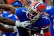 GAINESVILLE, FL - OCTOBER 06: Tharold Simon #24 of the LSU Tigers attempts to tackle Quinton Dunbar #1 of the Florida Gators during the game at Ben Hill Griffin Stadium on October 6, 2012 in Gainesville, Florida. (Photo by Sam Greenwood/Getty Images)
