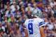 BALTIMORE, MD - OCTOBER 14: Quarterback Tony Romo #9 of the Dallas Cowboys walks off the field after a failed third down conversion against the Baltimore Ravens in the first quarter at M&T Bank Stadium on October 14, 2012 in Baltimore, Maryland. The Baltimore Ravens won, 31-29. (Photo by Patrick Smith/Getty Images)