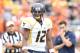 Oct 6, 2012; Austin, TX, USA; West Virginia Mountaineers quarterback Geno Smith (12) on the field during warmups before the game against the Texas Longhorns at Darrell K Royal-Texas Memorial Stadium. Mandatory Credit: Tim Heitman-US PRESSWIRE