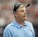 HOUSTON, TX - SEPTEMBER 30: Head coach Mike Munchak of the Tennessee Titans checks the scoreboard against the Houston Texans at Reliant Arena at Reliant Park on September 30, 2012 in Houston, Texas. (Photo by Bob Levey/Getty Images)