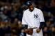 NEW YORK, NY - OCTOBER 12: CC Sabathia #52 of the New York Yankees reacts after getting out of the eighth inning against the Baltimore Orioles during Game Five of the American League Division Series at Yankee Stadium on October 12, 2012 in New York, New York. (Photo by Elsa/Getty Images)