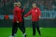 WARSAW, POLAND - OCTOBER 16: England manager Roy Hodgson speaks to members of the Polish squad during the rain before the FIFA 2014 World Cup Qualifier between Poland and England at the National Stadium on October 16, 2012 in Warsaw, Poland. (Photo by Michael Regan/Getty Images)