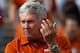 DALLAS, TX - OCTOBER 13: Head coach Bob Stoops of the Oklahoma Sooners (L) talks with head coach Mack Brown of the Texas Longhorns before the Oklahoma Sooners take on the Texas Longhorns at Cotton Bowl on October 13, 2012 in Dallas, Texas. (Photo by Tom Pennington/Getty Images)