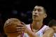 HOUSTON, TX - OCTOBER 12: Jeremy Lin #7 of the Houston Rockets waits at the free throw line during the game against the New Orleans Hornets at the Toyota Center on October 12, 2012 in Houston, Texas. NOTE TO USER: User expressly acknowledges and agrees that, by downloading and or using this photograph, User is consenting to the terms and conditions of the Getty Images License Agreement. (Photo by Scott Halleran/Getty Images)