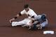 It doesn't look like Holliday is in position to touch the base.