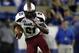 LEXINGTON, KY - SEPTEMBER 29: Marcus Lattimore #21 of the South Carolina Gamecocks breaks free from the Kentucky Wildcats during at Commonwealth Stadium on September 29, 2012 in Lexington, Kentucky. (Photo by John Sommers II/Getty Images)