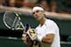 LONDON, ENGLAND - JUNE 28: Rafael Nadal of Spain reacts during his Gentlemen's Singles second round match against Lukas Rosol of the Czech Republic on day four of the Wimbledon Lawn Tennis Championships at the All England Lawn Tennis and Croquet Club on June 28, 2012 in London, England. (Photo by Clive Rose/Getty Images)