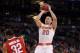 Mar 24, 2012; Boston, MA, USA; Syracuse Orange guard Brandon Triche (20) shoots over Ohio State Buckeyes guard Lenzelle Smith, Jr. (32) in the first half of the finals in the east region of the 2012 NCAA men's basketball tournament at TD Garden. Mandatory Credit: Greg M. Cooper-US PRESSWIRE