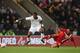 NORWICH, ENGLAND - OCTOBER 12: Wilfried Zaha of England is tackled by Luka Milivojevic of Serbia during the Under 21 European Championship Play Off between England U21 and Serbia U21 at Carrow Road on October 12, 2012 in Norwich, England. (Photo by Phil Cole/Getty Images)