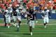 October 13, 2012; Oxford, MS, USA; Mississippi Rebels running back Jeff Scott (3) scores on a 55-yard catch and run against the Auburn Tigers at Vaught-Hemingway Stadium. Mandatory Credit: Chuck Cook - US PRESSWIRE