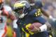 ANN ARBOR, MI - OCTOBER 13: Denard Robinson #16 of the Michigan Wolverines runs for a second quarter touchdown while playing the Illinois Fighting Illini at Michigan Stadium on October 13, 2012 in Ann Arbor, Michigan. (Photo by Gregory Shamus/Getty Images)