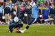NASHVILLE, TN - OCTOBER 11: Brett Kern #6 of the Tennessee Titans holds the ball during a field goal attempt for teammate kicker Rob Bironas #2 during a at LP Field on October 11, 2012 in Nashville, Tennessee. (Photo by Frederick Breedon/Getty Images)