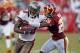 TAMPA, FL - SEPTEMBER 30: Receiver Mike Williams #19 of the Tampa Bay Buccaneers is tackled by defender Josh Wilson #26 of the Washington Redskins during the game at Raymond James Stadium on September 30, 2012 in Tampa, Florida. (Photo by J. Meric/Getty Images)