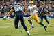 Sep 24, 2012; Seattle, WA, USA; Green Bay Packers quarterback Aaron Rodgers (12) looks for an open receiver while running from Seattle Seahawks middle linebacker Bobby Wagner (54) during the 2nd half at CenturyLink Field. Seattle defeated Green Bay 14-12. Mandatory Credit: Steven Bisig-US PRESSWIRE