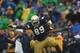 SOUTH BEND, IN - OCTOBER 13: Kapron Lewis-Moore #89 and Matthias Farley #41 of the Notre Dame Fighting Irish celebrate a blocking field goal against the Standford Cardinal at Notre Dame Stadium on October 13, 2012 in South Bend, Indiana. Notre Dame defeated Stanford 20-13 in overtime. (Photo by Jonathan Daniel/Getty Images)